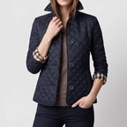 Navy jacket on an off-gray studio background - 2