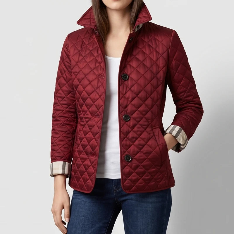 Red jacket on an off-gray studio background
