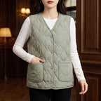 Green vest in a dark wood interior
