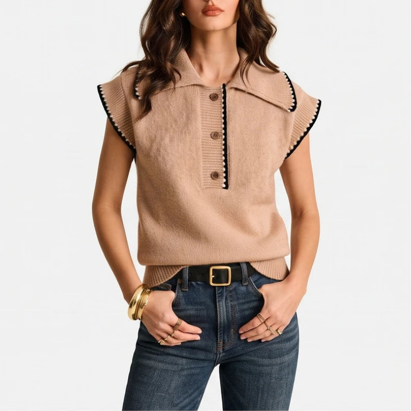 Brown knit vest on an off-gray studio background
