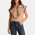 Brown knit vest on an off-gray studio background - 2