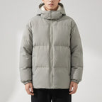 Green cotton jackets in a dark wood interior