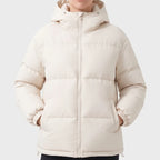 Beige jacket on an off-gray studio background