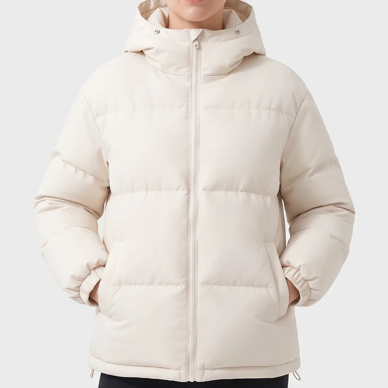 Beige jacket on an off-gray studio background