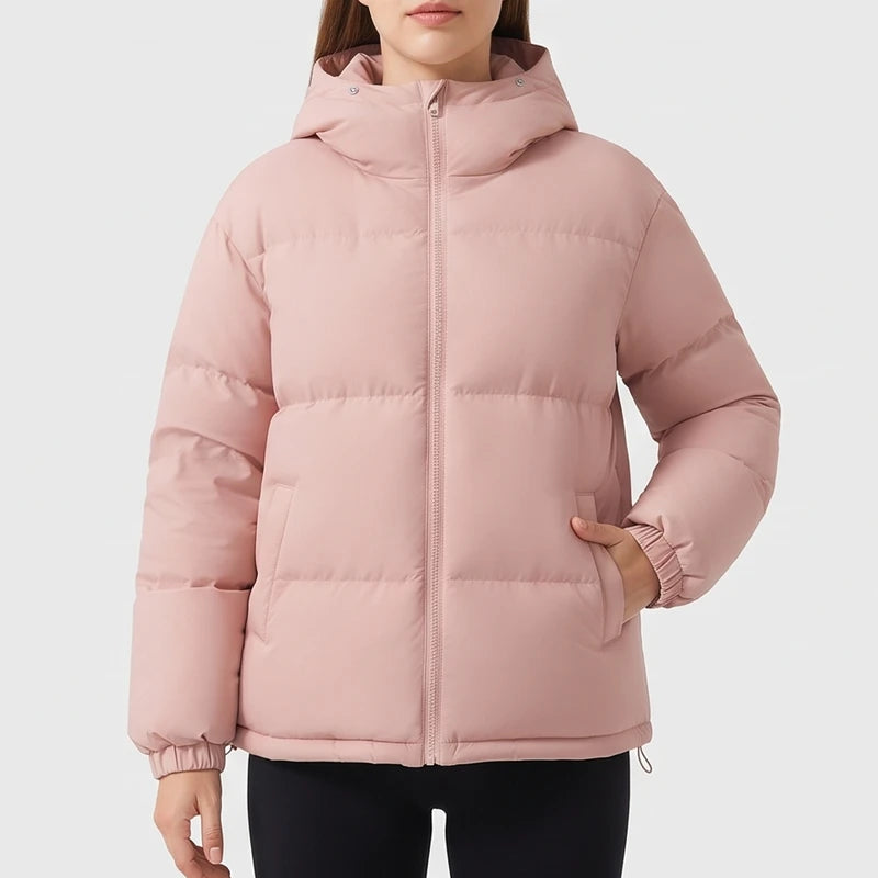 Pink jacket on an off-gray studio background