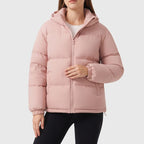 Pink jacket on an off-gray studio background - 2