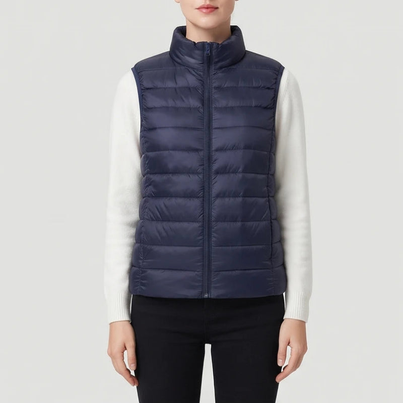 Blue cotton vest on an off-gray studio background