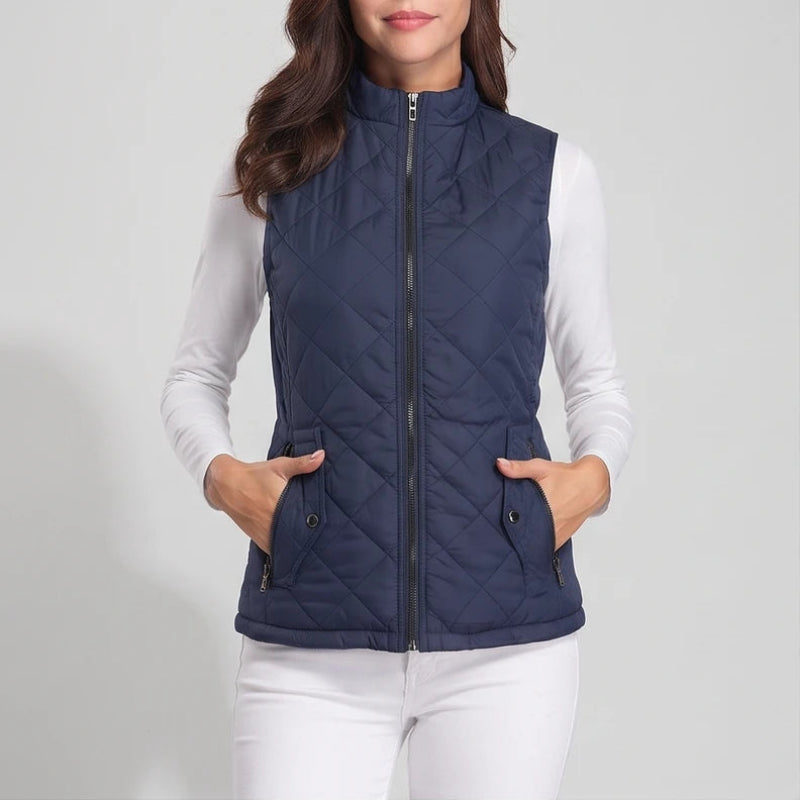 Blue cotton vest on an off-gray studio background