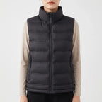 Model wearing Black cotton vest in a studio