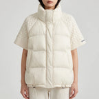 Model wearing 233beige cotton vest in a studio