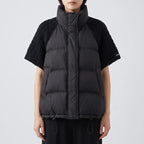 Model wearing 233black cotton vest in a studio