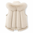 Back view of a sleeveless cream vest with a fur collar and vertical fur panels, trimmed with fur at the bottom hem.