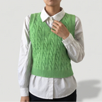 Green knit sweater on an off-gray studio background - 2
