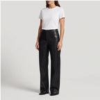 Black leather pants on an off-gray studio background - 2