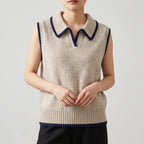 Khaki knitted vest on an off-gray studio background