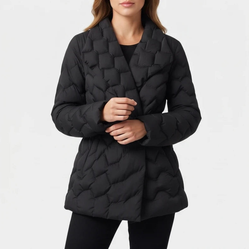 Woman wearing a black quilted puffer coat with a wide lapel collar and an asymmetrical wrap front.