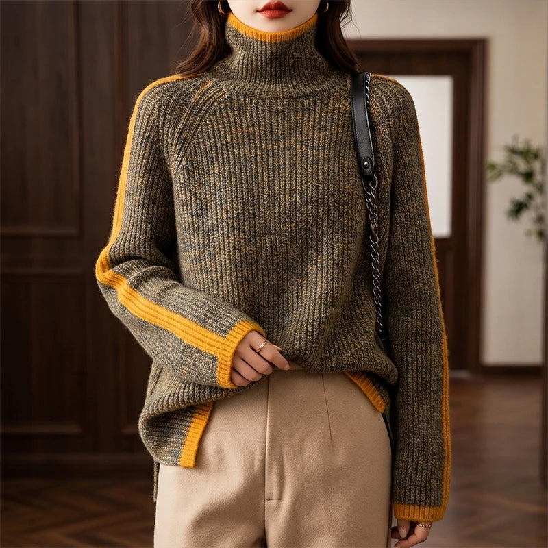 Woman wearing a mottled dark green and yellow ribbed knit roll neck jumper with yellow stripes on the sleeves.